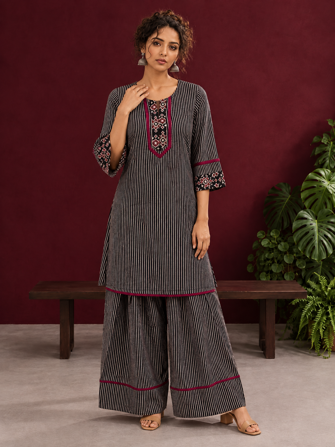Classic Black & Beige Ajrakh Striped Cotton Co-Ord Set with Ikat Panel Neckline and Maroon Trim Details — front view