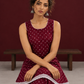 Elegant Maroon Bandhani Print Co-Ord Set with Lace Trim Hem and Scoop Neckline — seated detail