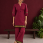Elegant Maroon Silk Co-Ord Set with Contrast Black & Gold Border Detailing on Hem and Sleeves — front view