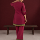 Elegant Maroon Silk Co-Ord Set with Contrast Black & Gold Border Detailing on Hem and Sleeves — back view