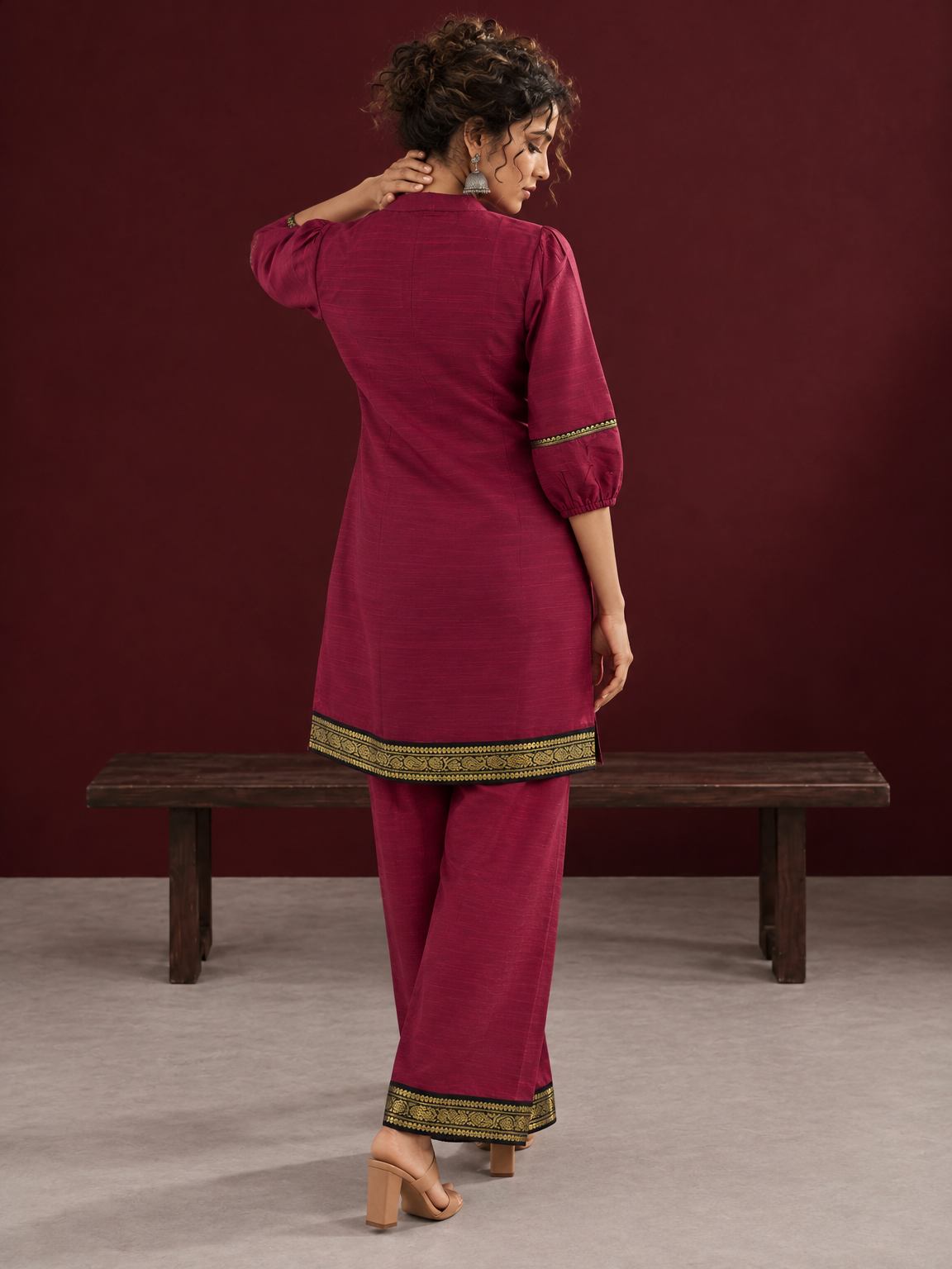 Elegant Maroon Silk Co-Ord Set with Contrast Black & Gold Border Detailing on Hem and Sleeves — back view