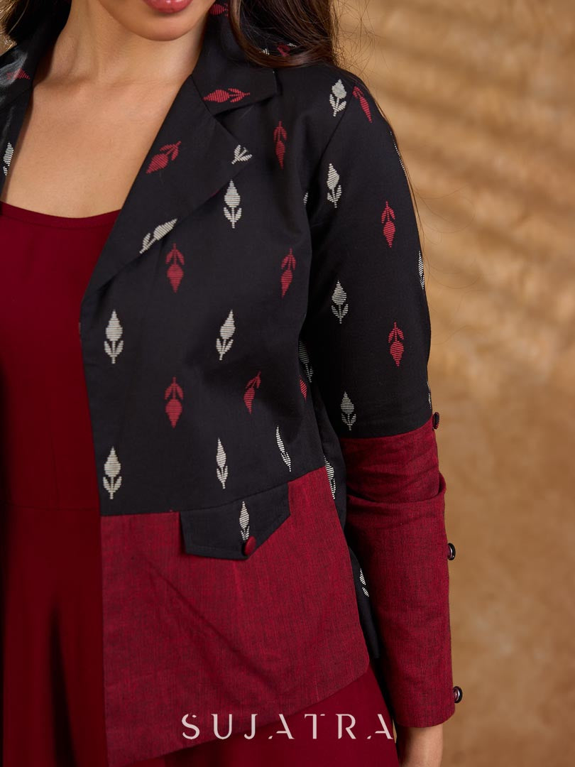 Sharp black and maroon half-and-half Jamdani jacket with functional flap pockets, offering a structured silhouette with bold contrast and refined detailing for elevated corporate styling.