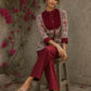 Elegant maroon floral top with intricate maroon pleats, high neckline, covered buttons, and coordinating sleeve cuffs.