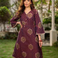 Elegant wine-purple Ikat dress with flowy sleeves, finished with a belt for a softly cinched silhouette.