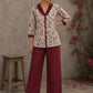 Soft white floral cotton top finished with maroon cuffs, pleated collar, and delicate feminine elegance.