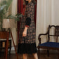 Black ajrakh flared dress with zari work and georgette hemline