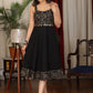 Exquisite black cotton dress with golden foil warli print combination and coin embellishments