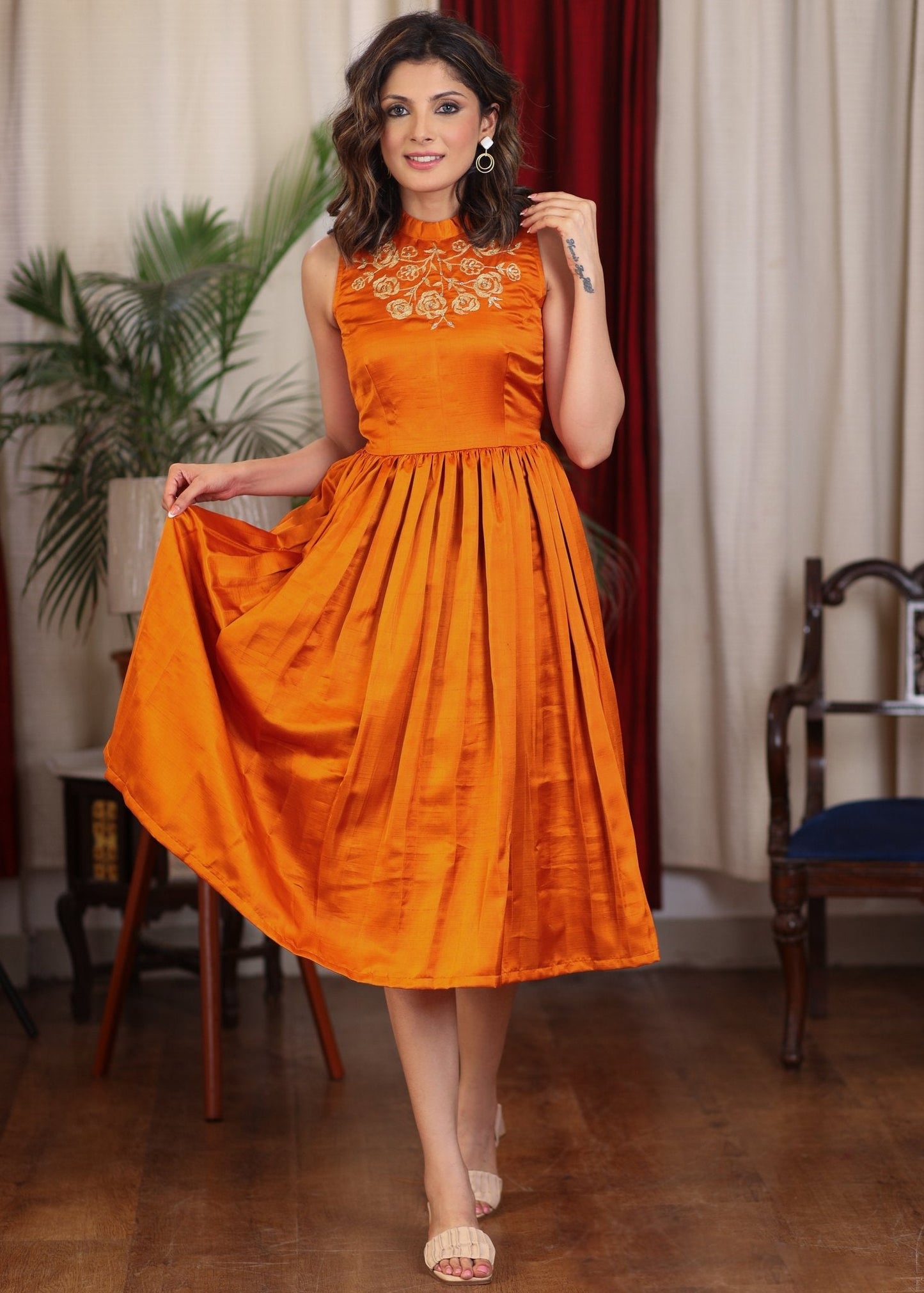 Exclusive orange gathered cotton silk dress with turtle neck and floral embroidery