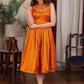 Exclusive orange gathered cotton silk dress with turtle neck and floral embroidery