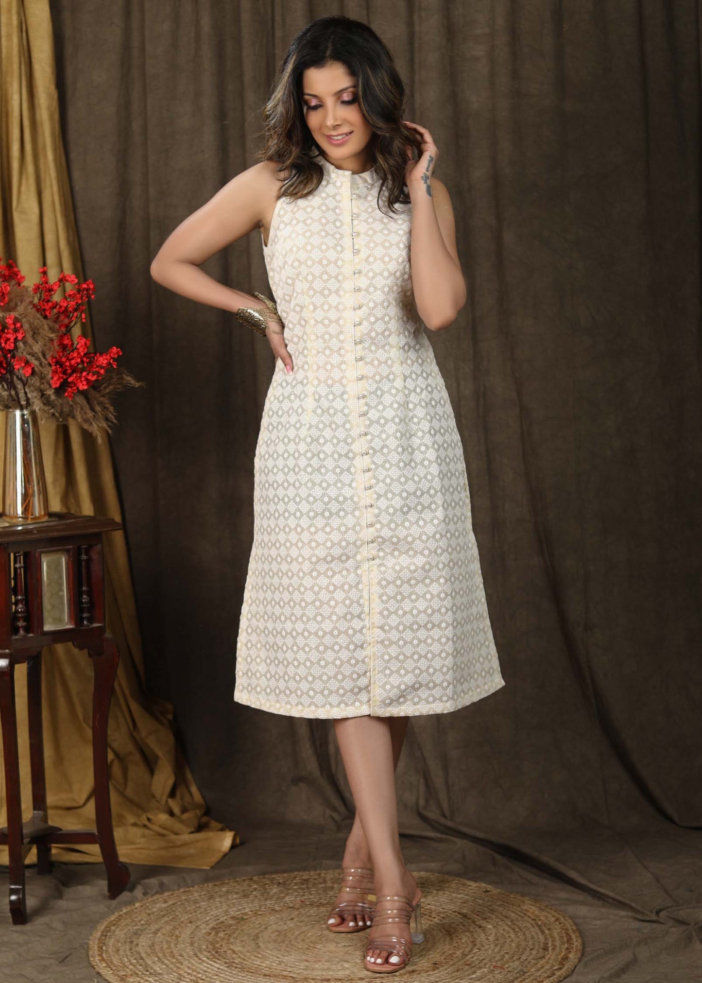 Stlyish ivory chikankari  sleeveless dress with all over self contemporary design