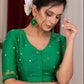 Emrald green cotton silk blouse with overall mirror embroidery highlighted with banarasi lace