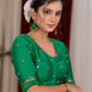 Emrald green cotton silk blouse with overall mirror embroidery highlighted with banarasi lace