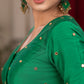 Emrald green cotton silk blouse with overall mirror embroidery highlighted with banarasi lace