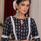 Standout kantha print navy blue blouse with bell sleeve highlighted with macrame lace