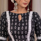 Standout kantha print navy blue blouse with bell sleeve highlighted with macrame lace