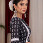 Standout kantha print navy blue blouse with bell sleeve highlighted with macrame lace