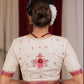 Elegant ivory cotton blouse with overall hand embroidered madhubani motif