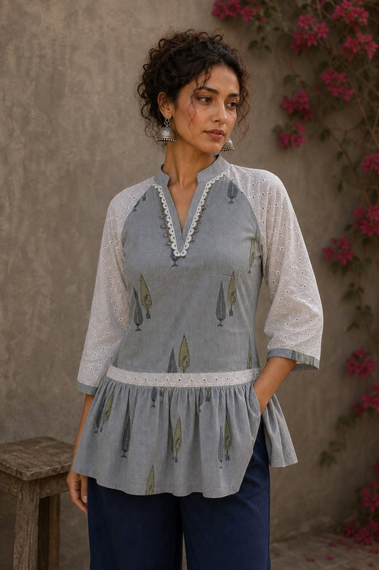 Soft blue Jaipur hairline stripe top featuring Hakoba raglan sleeves and a flattering gathered waist silhouette.