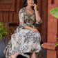 Elegant black–white floral kurta featuring a graceful bias silhouette, intricate mirror embroidery on the neck and sleeves, and a sweetheart neckline.