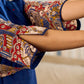 Navy Blue Artisanal Kalamkari prints enhanced with statement sleeves and a waist-defining knotted Kalamkari belt.