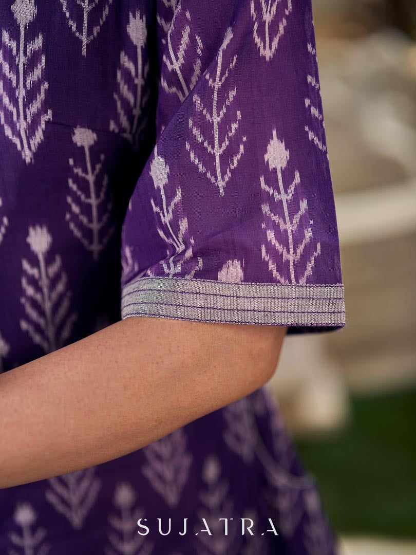 Elegant purple mercerised Ikat dress designed with a softly folded round neckline revealing grey highlights and balanced grey accents throughout