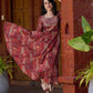 Exquisite deep maroon printed kurta with a graceful bias silhouette, intricate handwork on the yoke, and scalloped sleeve detailing.