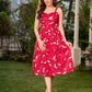 Pretty red dress featuring a sweetheart neckline, pleated waist panel, and soft gathers that create a graceful flow.