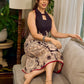 Black Heritage-inspired Kalamkari halter dress with elegant maroon contrast detailing.