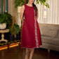 Maroon block printed sleeveless dress with hand block printed floral side panel, off-white accents, and pearl embellishments for a refined, elegant look.