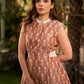 Chic champagne beige Ikat dress elevated with Hakoba accents, a relaxed drop-shoulder fit, mandarin neckline, and fluid side gathers detailed with Hakoba flaps.