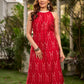 Statement red Ikat halter-neck dress accented in white, designed with a box pleat at the neckline for fluid drape.