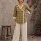 Mustard Jaipur cotton wrap-style Angarkha top with off-white Hakoba cuffs and graceful contrast accents.