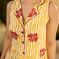 Yellow and white zebra-striped hand block printed sleeveless vintage luxe dress with maroon bird motifs and matching accents for a bold, elegant statement look.