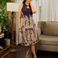 Black Heritage-inspired Kalamkari halter dress with elegant maroon contrast detailing.