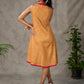Mustard Gond printed mandarin collar dress with vibrant pink accents.
