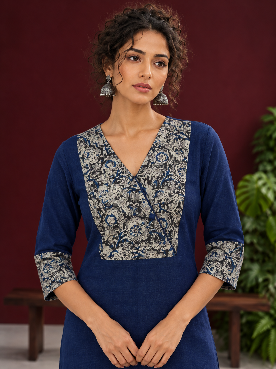 Elegant Navy Blue Kurta with Contrast Kalamkari Print Yoke and Matching Sleeve Cuffs — fabric detail