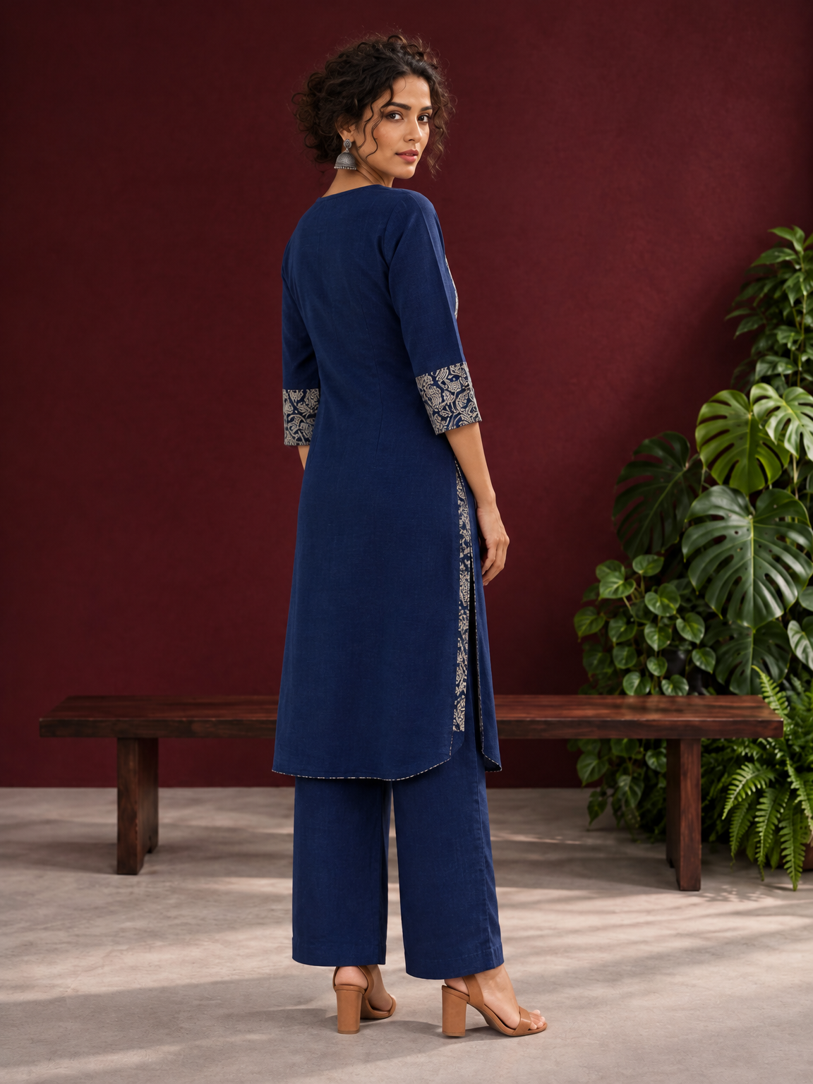 Elegant Navy Blue Kurta with Contrast Kalamkari Print Yoke and Matching Sleeve Cuffs — back view