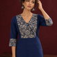 Elegant Navy Blue Kurta with Contrast Kalamkari Print Yoke and Matching Sleeve Cuffs — styled view