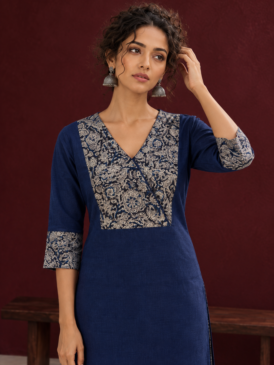 Elegant Navy Blue Kurta with Contrast Kalamkari Print Yoke and Matching Sleeve Cuffs — styled view