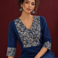 Elegant Navy Blue Kurta with Contrast Kalamkari Print Yoke and Matching Sleeve Cuffs — seated detail