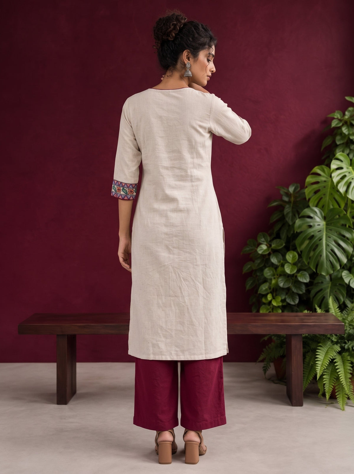 Timeless Off-White Cotton Kurta with Handpainted Madhubani overlapping Neckline & Matching Sleeve Cuffs — back view
