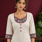 Timeless Off-White Cotton Kurta with Handpainted Madhubani overlapping Neckline & Matching Sleeve Cuffs — styled view
