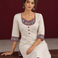 Timeless Off-White Cotton Kurta with Handpainted Madhubani overlapping Neckline & Matching Sleeve Cuffs — seated detail