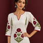 White Cotton Kurta with Hand Block Printed Red Floral Motifs and red Keyhole Neckline Trim — styled view