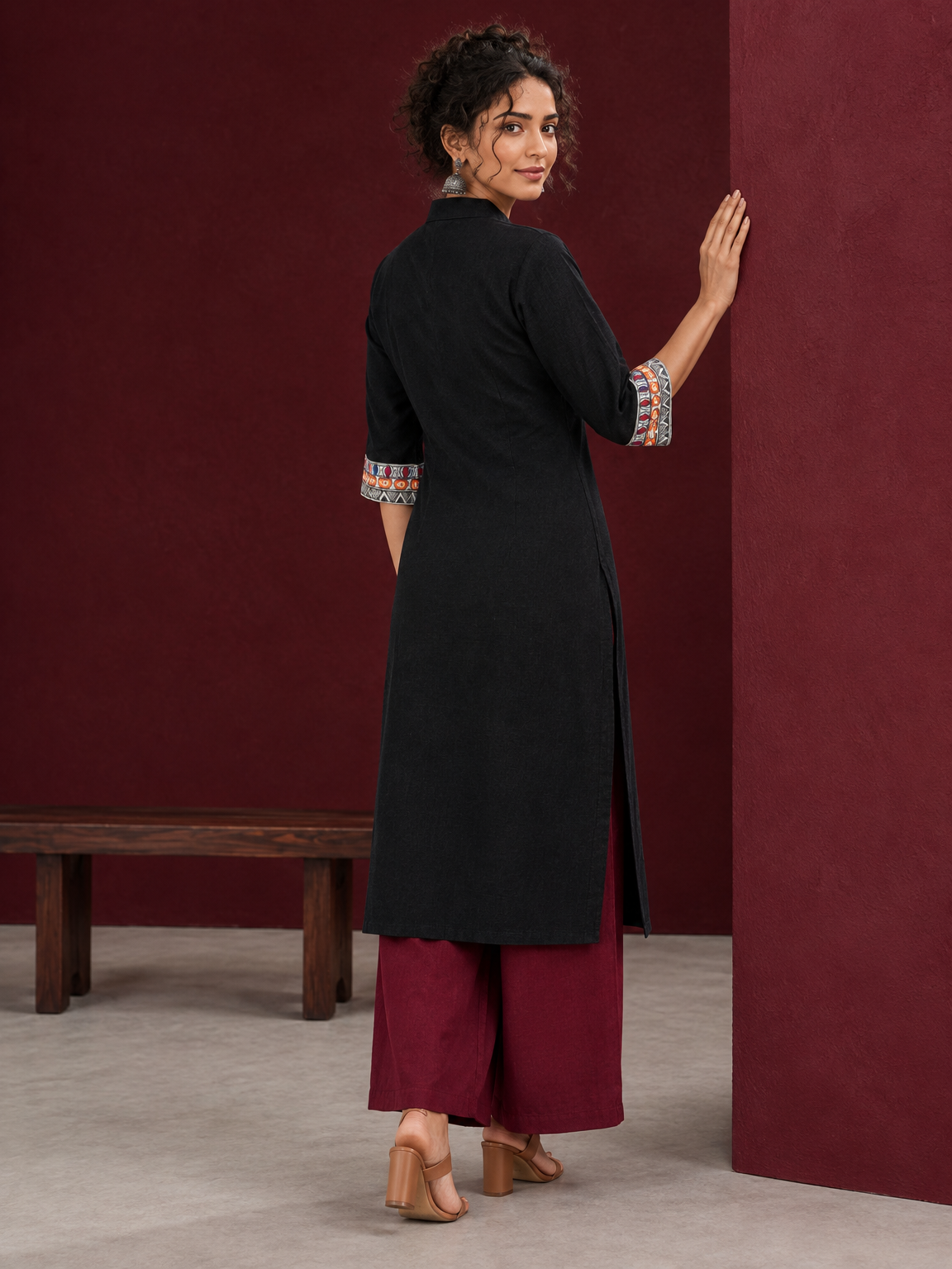 Classic Black Cotton Kurta with hand painted Madhubani neck panels & Matching Sleeve Cuffs — back view