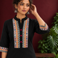 Classic Black Cotton Kurta with hand painted Madhubani neck panels & Matching Sleeve Cuffs — styled view