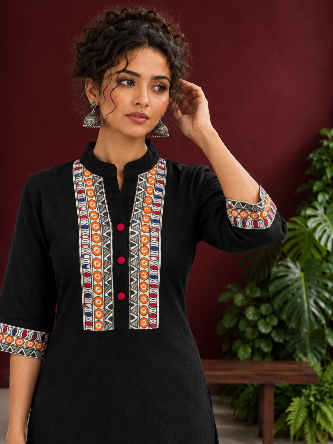 Classic Black Cotton Kurta with hand painted Madhubani neck panels & Matching Sleeve Cuffs — styled view