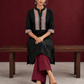 Classic Black Cotton Kurta with hand painted Madhubani neck panels & Matching Sleeve Cuffs — seated