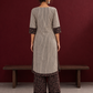 Elegant Beige Ajrakh Striped Cotton Kurta with Contrast Black Floral patch in Neckline & Sleeve Cuffs — back view