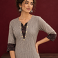 Elegant Beige Ajrakh Striped Cotton Kurta with Contrast Black Floral patch in Neckline & Sleeve Cuffs — fabric detail